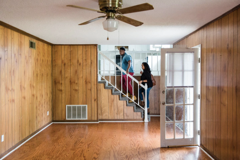 Rick and Astardii Hopkins explore a home. The National Association of Real Estate Brokers recently launched a campaign aimed at getting younger people of color to embrace homeownership. (Cameron Carnes/For The Washington Post)